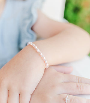 
                
                    Load image into Gallery viewer, Bella - Sterling Silver Pearl Cross Bracelet for Babies and Girls
                
            