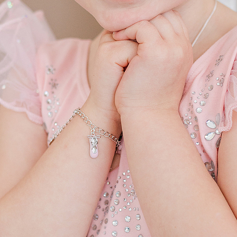 Girl closeup wearing Personalized Sterling Silver Dance Charm Bracelet Engraved Charm