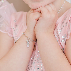 Girl closeup wearing Personalized Sterling Silver Dance Charm Bracelet Engraved Charm