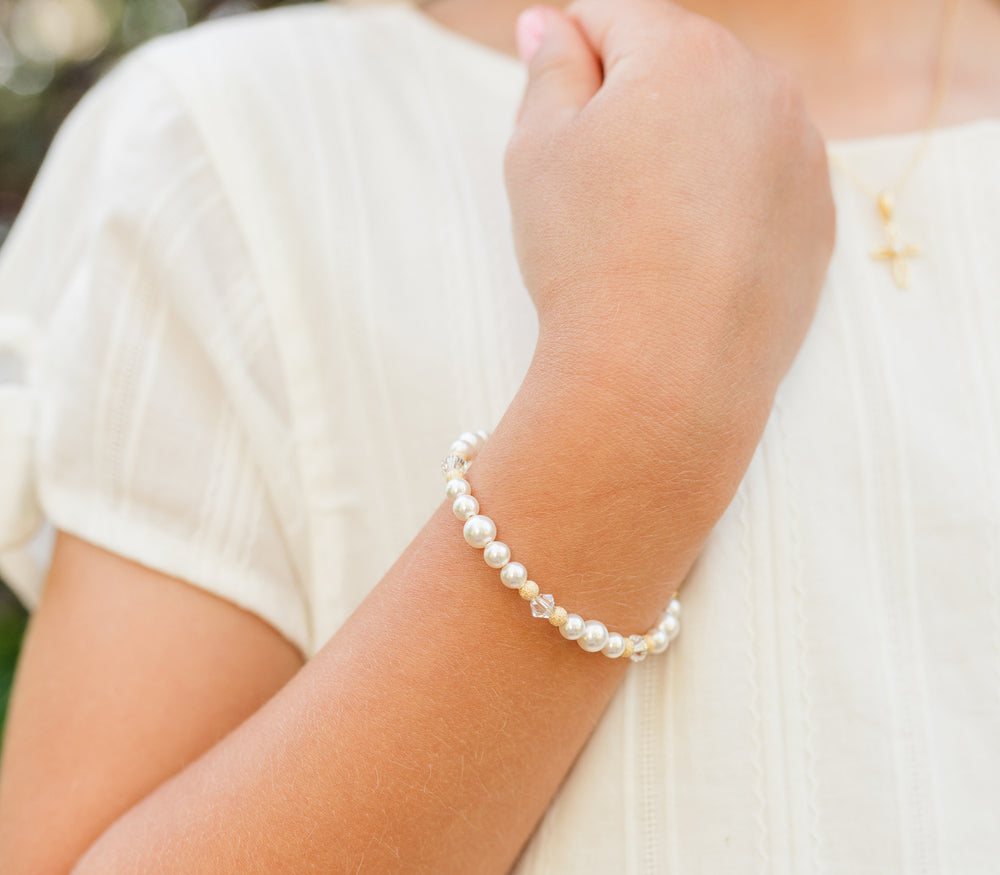 little girl wearing Gold-Plated Simulated Pearl Baby Bracelet