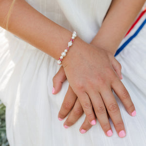 girl's hands wearing Little Girls Sterling Silver Baby Bracelet