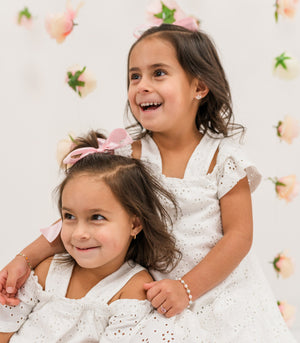 Girls wearing Gold-Plated Pink Pearl Bracelet