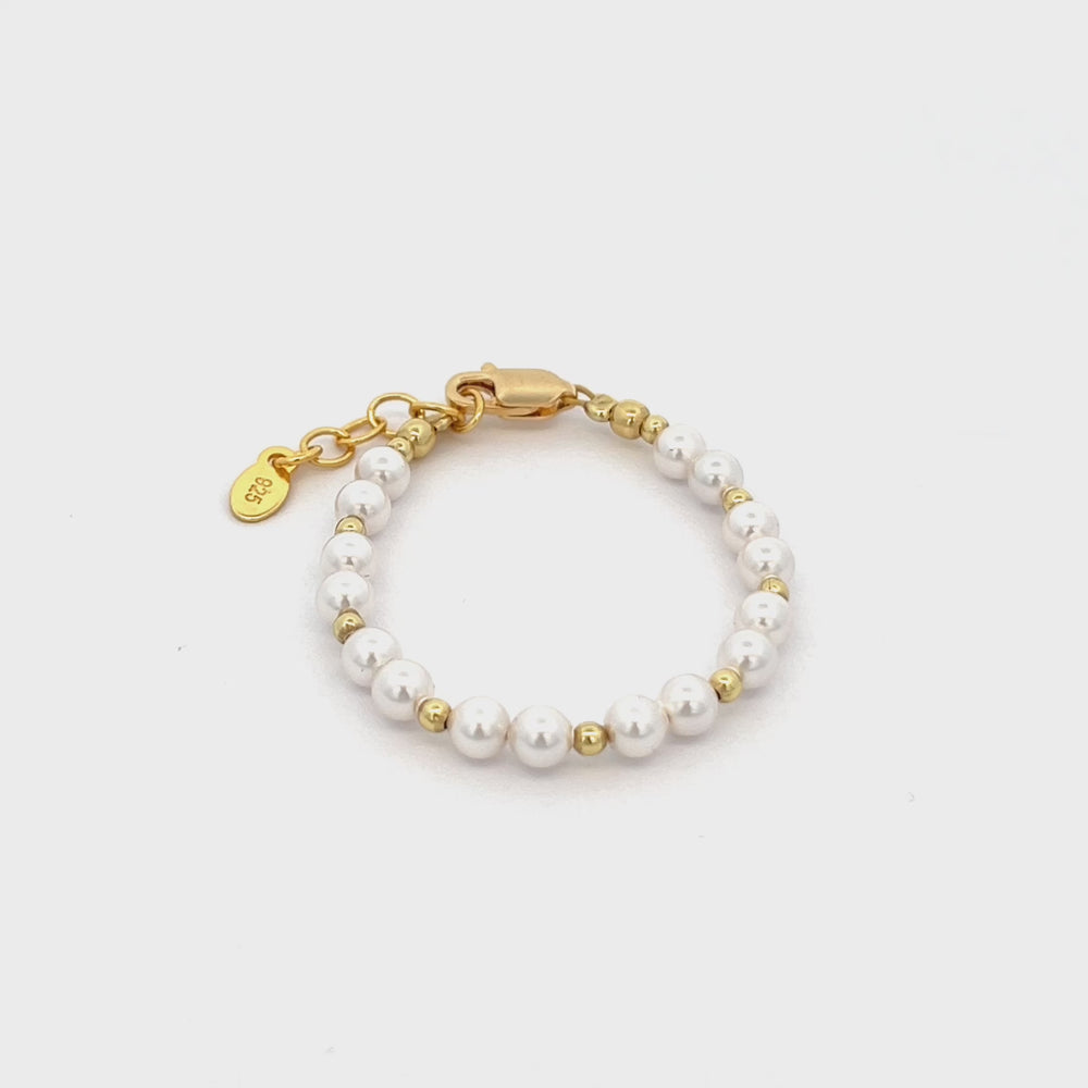 
                
                    Load and play video in Gallery viewer, Brynn - 14K Gold Plated Pearl Baby and Kids Bracelet
                
            