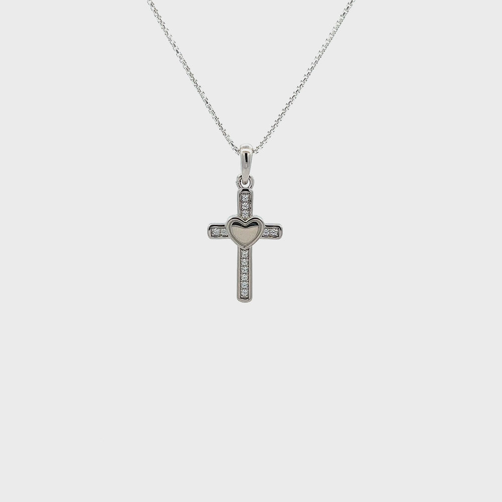 
                
                    Load and play video in Gallery viewer, Sterling Silver Children&amp;#39;s Cross CZ Necklace with Open Heart
                
            