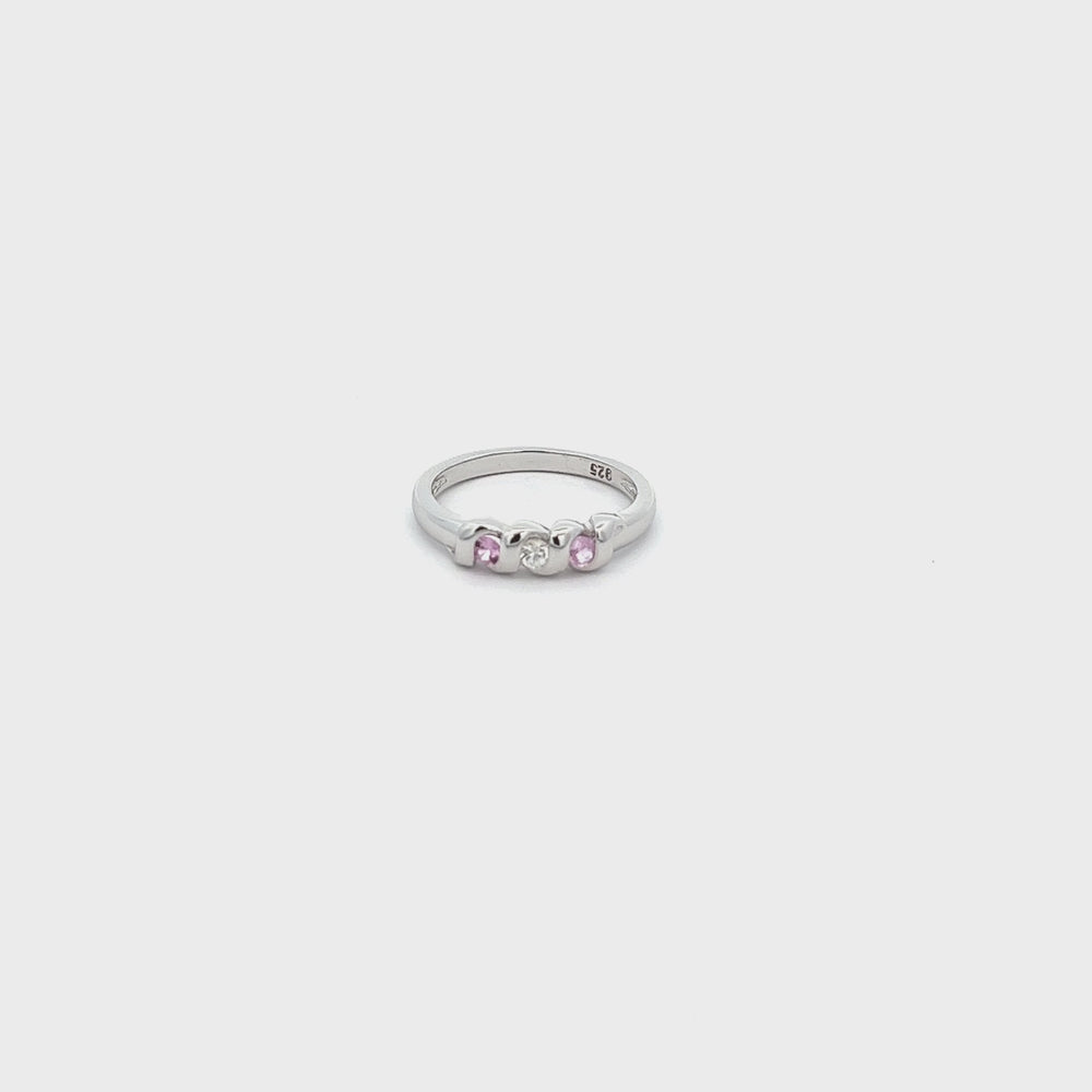
                
                    Load and play video in Gallery viewer, Timeless Sterling Silver Baby Ring with Genuine Pink/White Sapphires
                
            
