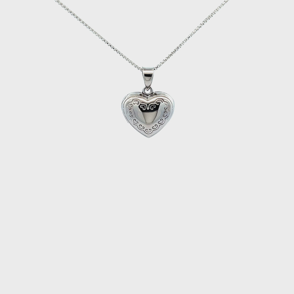 
                
                    Load and play video in Gallery viewer, Sterling Silver Children&amp;#39;s Heart Locket
                
            