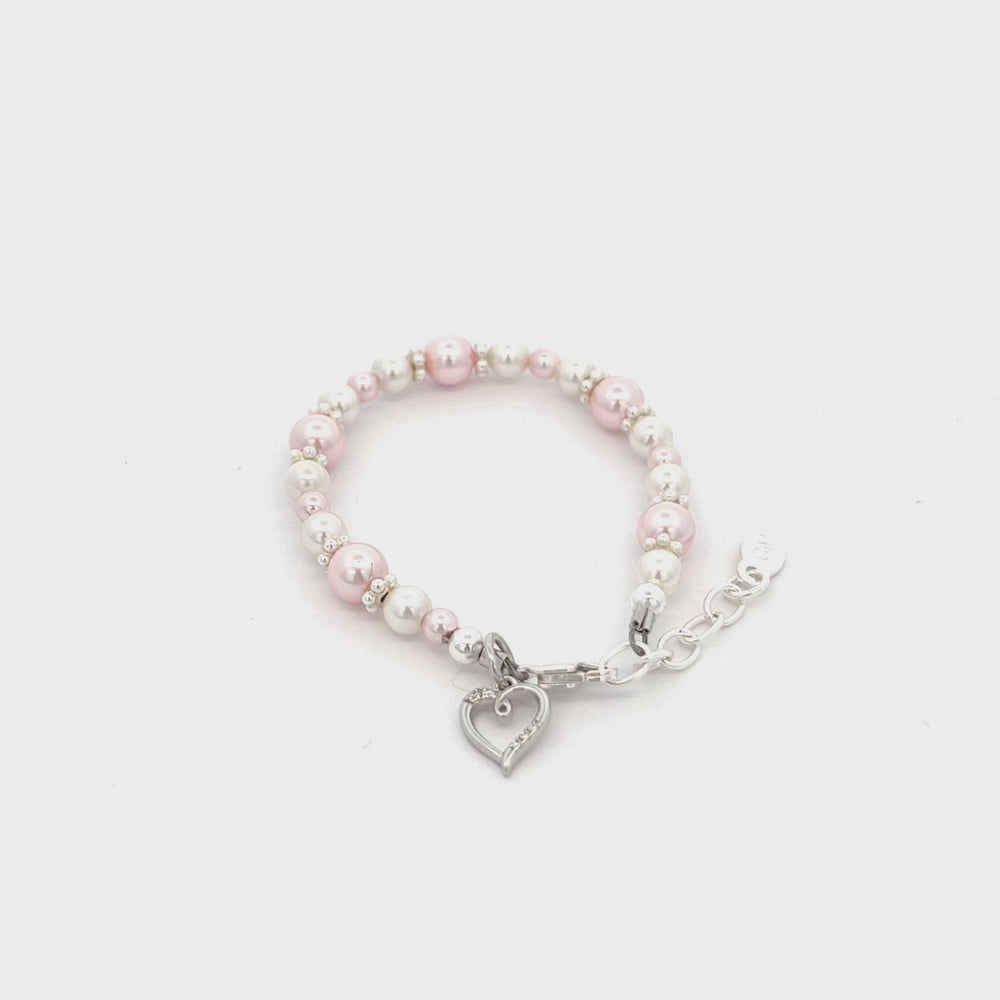 
                
                    Load and play video in Gallery viewer, Remi - Children&amp;#39;s Sterling Silver Pink &amp;amp; White Simulated Pearl Bracelet for Kids
                
            