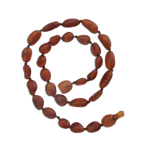 
                
                    Load image into Gallery viewer, Amber Teething Necklace for Teething Babies or Toddlers (Dark Cognac)
                
            